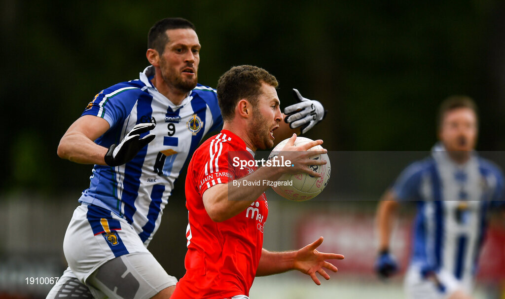 25 July 2020; Jack McCaffrey of Clontarf in action against Declan O'Mahoney of Ballyboden St Enda's during the Dublin County Senior Football Championship Round 1 match between Ballyboden St Endas and Clontarf at Pairc Uí Mhurchu in Dublin. GAA matches continue to take place in front of a limited number of people in an effort to contain the spread of the Coronavirus (COVID-19) pandemic. Photo by David Fitzgerald/Sportsfile