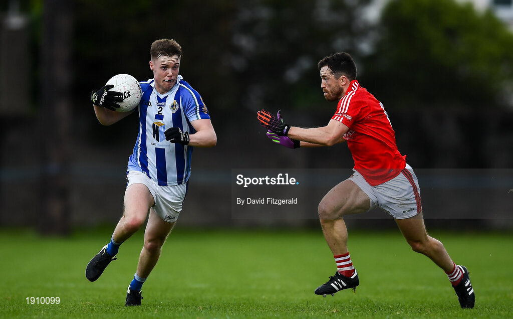 25 July 2020; Kieran Kennedy of Ballyboden St Enda's in action against Chris Barrett of Clontarf during the Dublin County Senior Football Championship Round 1 match between Ballyboden St Endas and Clontarf at Pairc Uí Mhurchu in Dublin. GAA matches continue to take place in front of a limited number of people in an effort to contain the spread of the Coronavirus (COVID-19) pandemic. Photo by David Fitzgerald/Sportsfile