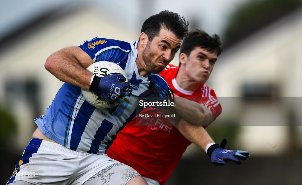 25 July 2020; Michael Darragh Macauley of Ballyboden St Enda's in action against Joe McDonagh of Clontarf during the Dublin County Senior Football Championship Round 1 match between Ballyboden St Endas and Clontarf at Pairc Uí Mhurchu in Dublin. GAA matches continue to take place in front of a limited number of people in an effort to contain the spread of the Coronavirus (COVID-19) pandemic. Photo by David Fitzgerald/Sportsfile