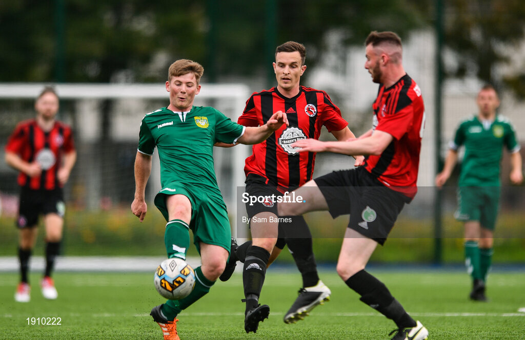 26 July 2020; Calvin Douglas of Usher Celtic in action against Gavin O'Brien, centre, and Stephen Moloney of Gorey Rangers during the FAI New Balance Junior Cup Quarter-Final match between Usher Celtic and Gorey Rangers at Grangegorman IT in Dublin. Competitive Soccer matches have been approved to return following the guidelines of Phase 3 of the Irish Government’s Roadmap for Reopening of Society and Business and protocols set down by the Soccer governing authorities. With games having been suspended since March, competitive games can take place with updated protocols including a limit of 200 individuals at any one outdoor event, including players, officials and a limited number of spectators, with social distancing, hand sanitisation and face masks being worn by those in attendance among other measures in an effort to contain the spread of the Coronavirus (COVID-19). Photo by Sam Barnes/Sportsfile