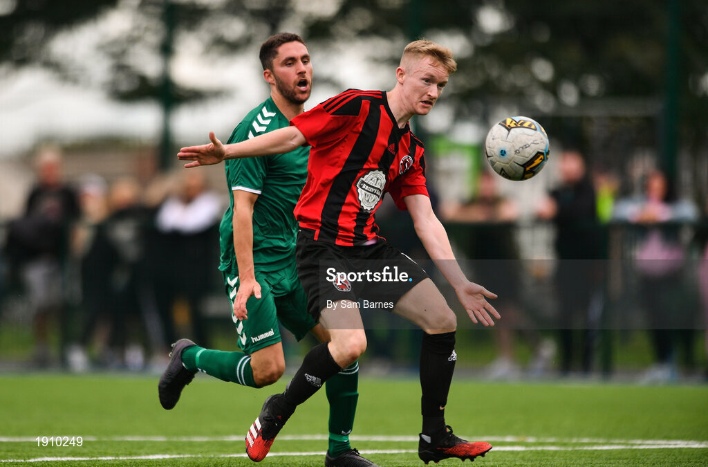 26 July 2020; Conor Casserly of Gorey Rangers in action against Jordan Buckley of Usher Celtic during the FAI New Balance Junior Cup Quarter-Final match between Usher Celtic and Gorey Rangers at Grangegorman IT in Dublin. Competitive Soccer matches have been approved to return following the guidelines of Phase 3 of the Irish Government’s Roadmap for Reopening of Society and Business and protocols set down by the Soccer governing authorities. With games having been suspended since March, competitive games can take place with updated protocols including a limit of 200 individuals at any one outdoor event, including players, officials and a limited number of spectators, with social distancing, hand sanitisation and face masks being worn by those in attendance among other measures in an effort to contain the spread of the Coronavirus (COVID-19). Photo by Sam Barnes/Sportsfile