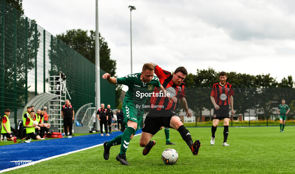 26 July 2020; Anthony Grouse of Usher Celtic in action against Jonathan Savage of Gorey Rangers during the FAI New Balance Junior Cup Quarter-Final match between Usher Celtic and Gorey Rangers at Grangegorman IT in Dublin. Competitive Soccer matches have been approved to return following the guidelines of Phase 3 of the Irish Government’s Roadmap for Reopening of Society and Business and protocols set down by the Soccer governing authorities. With games having been suspended since March, competitive games can take place with updated protocols including a limit of 200 individuals at any one outdoor event, including players, officials and a limited number of spectators, with social distancing, hand sanitisation and face masks being worn by those in attendance among other measures in an effort to contain the spread of the Coronavirus (COVID-19). Photo by Sam Barnes/Sportsfile