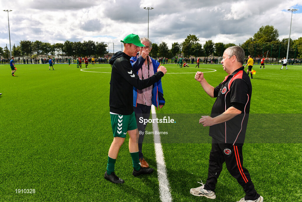 26 July 2020; Usher Celtic manager Wesley Doyle, left, and Gorey Rangers manager Ben Casserly bump fists following during the FAI New Balance Junior Cup Quarter-Final match between Usher Celtic and Gorey Rangers at Grangegorman IT in Dublin. Competitive Soccer matches have been approved to return following the guidelines of Phase 3 of the Irish Government’s Roadmap for Reopening of Society and Business and protocols set down by the Soccer governing authorities. With games having been suspended since March, competitive games can take place with updated protocols including a limit of 200 individuals at any one outdoor event, including players, officials and a limited number of spectators, with social distancing, hand sanitisation and face masks being worn by those in attendance among other measures in an effort to contain the spread of the Coronavirus (COVID-19). Photo by Sam Barnes/Sportsfile