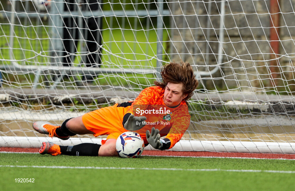 23 August 2020; Adam Carey of Killarney Celtic saves a penalty in the penalty shootout during the FAI Youth Cup Final match between Killarney Celtic and Douglas Hall at Mounthawk Park in Tralee, Kerry. Photo by Michael P Ryan/Sportsfile