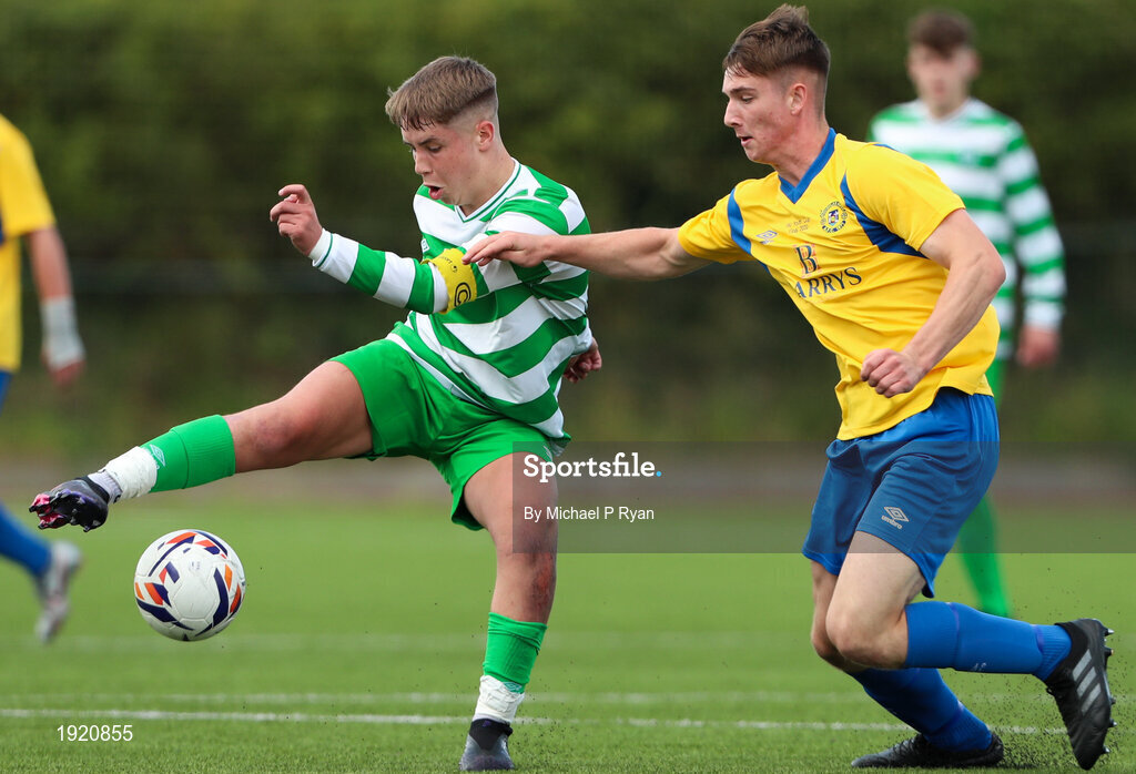 23 August 2020; Evan Looney of Killarney Celtic in action against Dean McCarthy of Douglas Hall during the FAI Youth Cup Final match between Killarney Celtic and Douglas Hall at Mounthawk Park in Tralee, Kerry. Photo by Michael P Ryan/Sportsfile