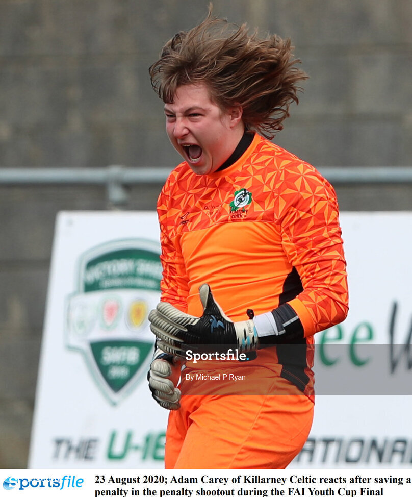 23 August 2020; Adam Carey of Killarney Celtic reacts after saving a penalty in the penalty shootout during the FAI Youth Cup Final match between Killarney Celtic and Douglas Hall at Mounthawk Park in Tralee, Kerry. Photo by Michael P Ryan/Sportsfile