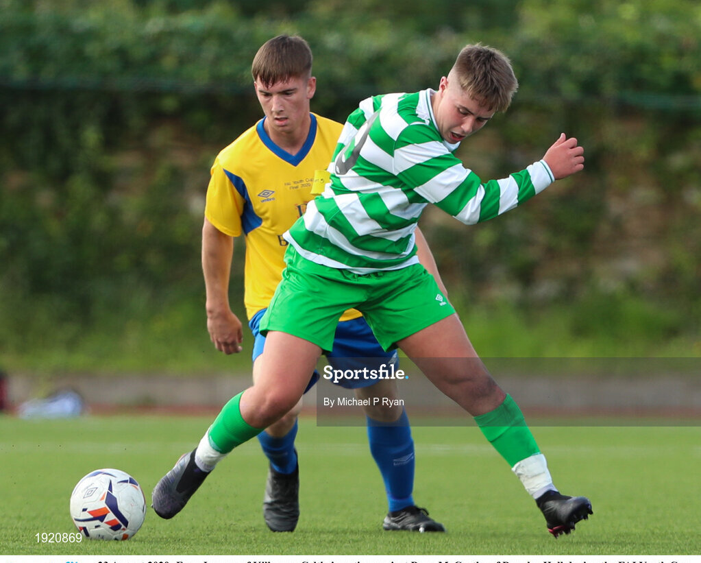 23 August 2020; Evan Looney of Killarney Celtic in action against Dean McCarthy of Douglas Hall during the FAI Youth Cup Final match between Killarney Celtic and Douglas Hall at Mounthawk Park in Tralee, Kerry. Photo by Michael P Ryan/Sportsfile