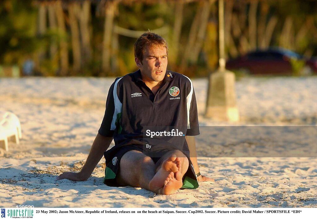23 May 2002; Jason McAteer, Republic of Ireland, relaxes on  on the beach at Saipan. Soccer. Cup2002. Soccer. Picture credit; David Maher / SPORTSFILE *EDI*