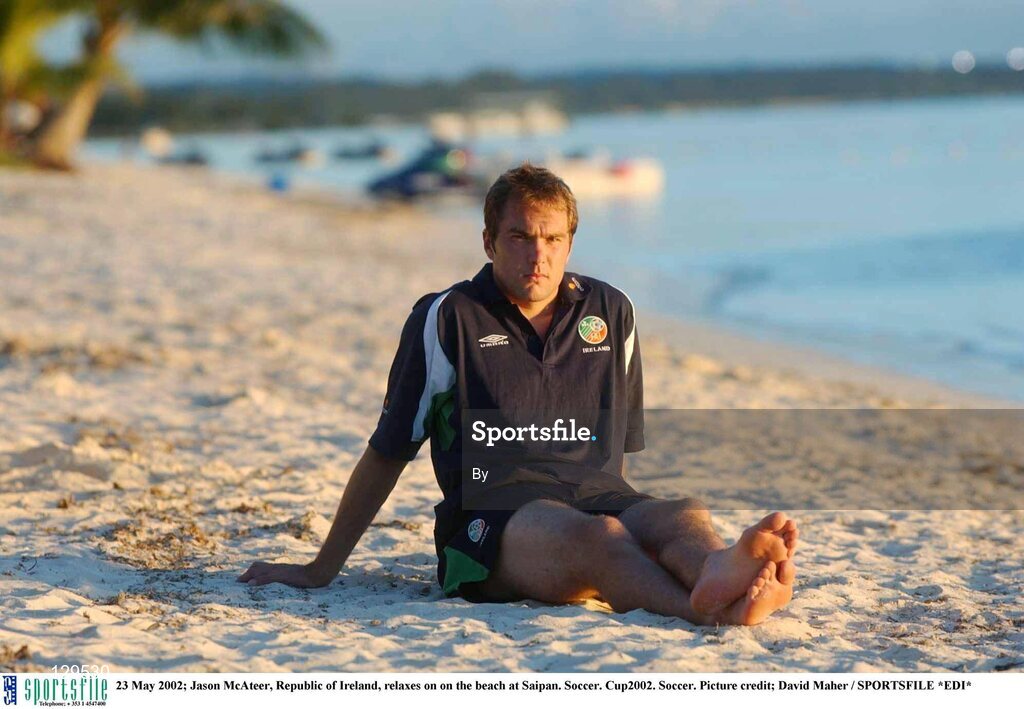 23 May 2002; Jason McAteer, Republic of Ireland, relaxes on on the beach at Saipan. Soccer. Cup2002. Soccer. Picture credit; David Maher / SPORTSFILE *EDI*