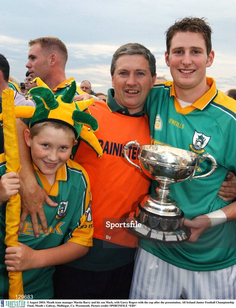 2 August 2003; Meath team manager Martin Barry and his son Mark, with Garry Rogers with the cup after the presentation. All Ireland Junior Football Championship Final, Meath v Galway, Mullingar, Co. Westmeath. Picture credit: SPORTSFILE *EDI*
