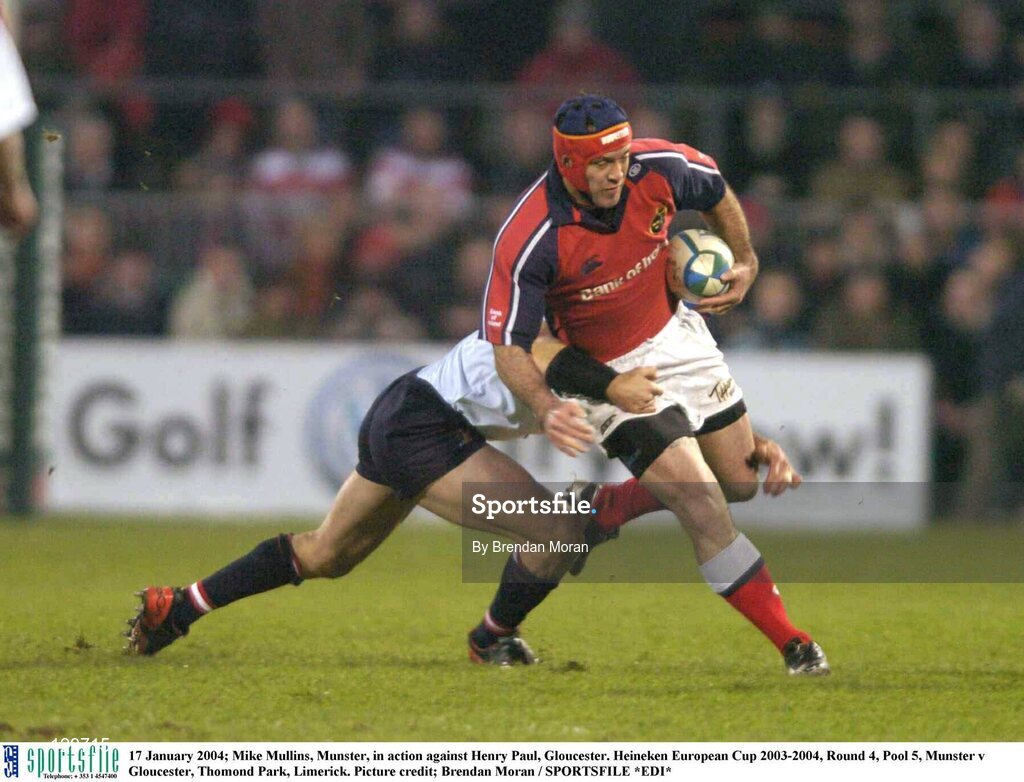 17 January 2004; Mike Mullins, Munster, in action against Henry Paul, Gloucester. Heineken European Cup 2003-2004, Round 4, Pool 5, Munster v Gloucester, Thomond Park, Limerick. Picture credit; Brendan Moran / SPORTSFILE *EDI*