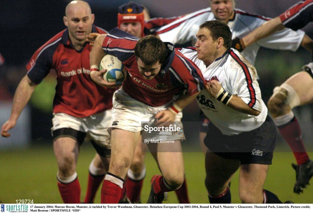 17 January 2004; Marcus Horan, Munster, is tackled by Trevor Woodman, Gloucester. Heineken European Cup 2003-2004, Round 4, Pool 5, Munster v Gloucester, Thomond Park, Limerick. Picture credit; Matt Browne / SPORTSFILE *EDI*