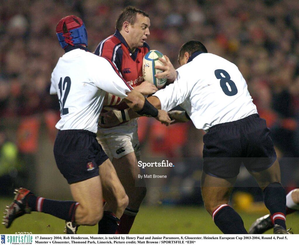 17 January 2004; Rob Henderson, Munster, is tackled by Henry Paul and Junior Paramore, 8, Gloucester. Heineken European Cup 2003-2004, Round 4, Pool 5, Munster v Gloucester, Thomond Park, Limerick. Picture credit; Matt Browne / SPORTSFILE *EDI*