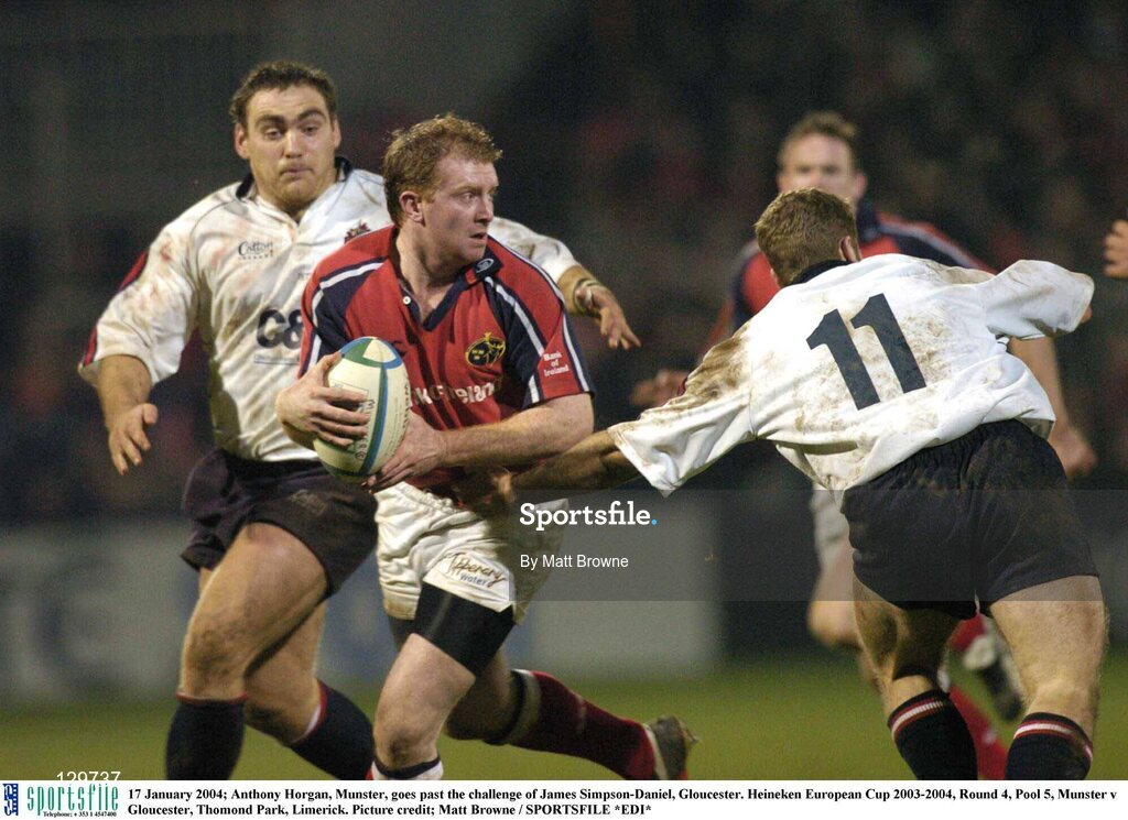17 January 2004; Anthony Horgan, Munster, goes past the challenge of James Simpson-Daniel, Gloucester. Heineken European Cup 2003-2004, Round 4, Pool 5, Munster v Gloucester, Thomond Park, Limerick. Picture credit; Matt Browne / SPORTSFILE *EDI*