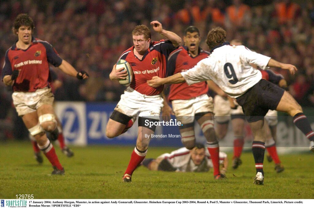 17 January 2004; Anthony Horgan, Munster, in action against Andy Gomarsall, Gloucester. Heineken European Cup 2003-2004, Round 4, Pool 5, Munster v Gloucester, Thomond Park, Limerick. Picture credit; Brendan Moran / SPORTSFILE *EDI*