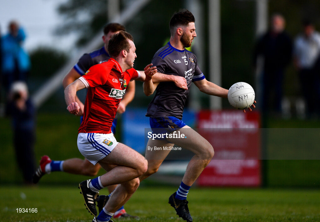 27 September 2020; John Clutterbuck of Naomh Mairtin in action against Éimhín Keenan of Ardee St Mary's during the Louth County Senior Football Championship Final match between Naomh Mairtin and Ardee St Mary’s at Darver Louth Centre of Excellence in Louth. Photo by Ben McShane/Sportsfile