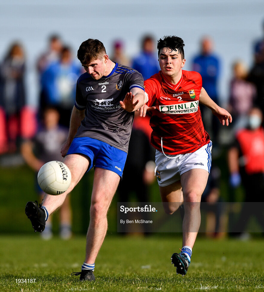 27 September 2020; Mark Whelan of Naomh Mairtin kicks a point despite the attention of Tom Jackson of Ardee St Mary's during the Louth County Senior Football Championship Final match between Naomh Mairtin and Ardee St Mary’s at Darver Louth Centre of Excellence in Louth. Photo by Ben McShane/Sportsfile