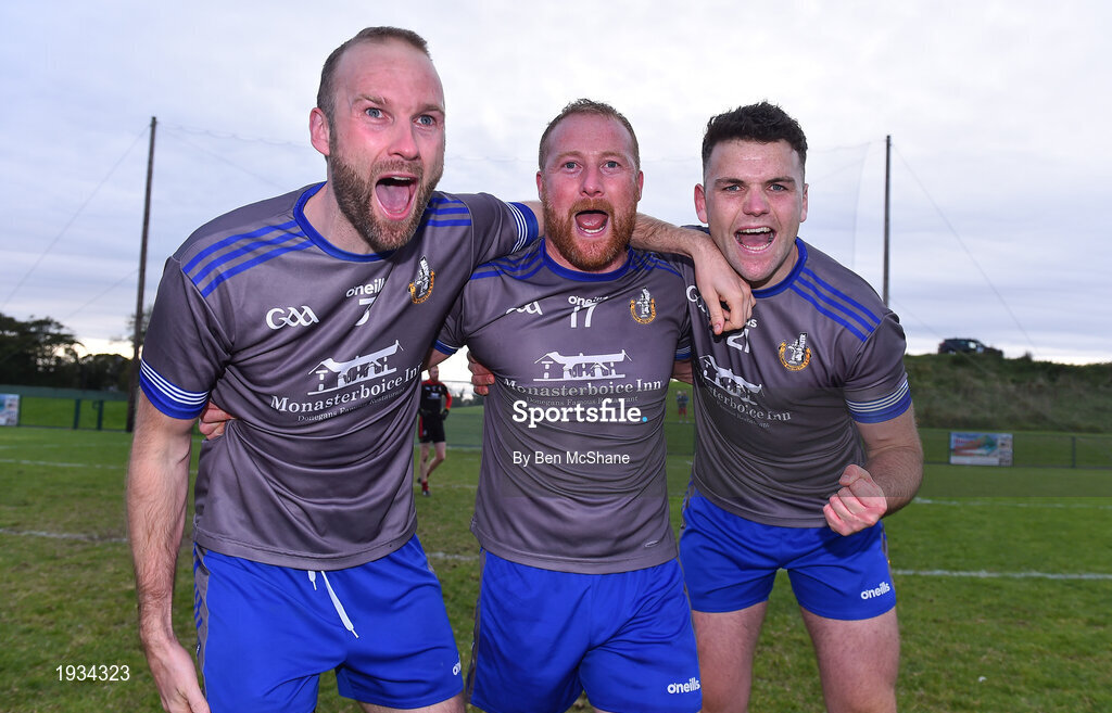 27 September 2020; Naomh Mairtin players, from left, Mick Fanning, JP Rooney and Conor Smyth celebrate following the Louth County Senior Football Championship Final match between Naomh Mairtin and Ardee St Mary’s at Darver Louth Centre of Excellence in Louth. Photo by Ben McShane/Sportsfile