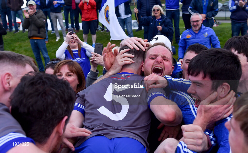 27 September 2020; John Clutterbuck, 5, of Naomh Mairtin celebrates with supporters following the Louth County Senior Football Championship Final match between Naomh Mairtin and Ardee St Mary’s at Darver Louth Centre of Excellence in Louth. Photo by Ben McShane/Sportsfile