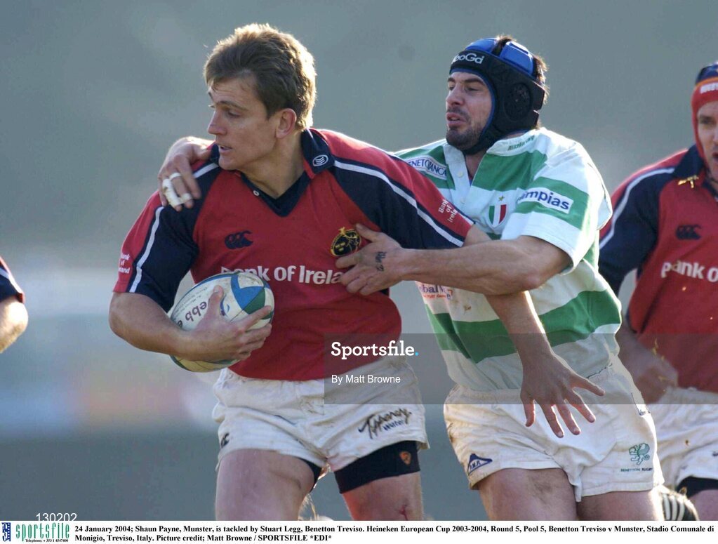 24 January 2004; Shaun Payne, Munster, is tackled by Stuart Legg, Benetton Treviso. Heineken European Cup 2003-2004, Round 5, Pool 5, Benetton Treviso v Munster, Stadio Comunale di Monigio, Treviso, Italy. Picture credit; Matt Browne / SPORTSFILE *EDI*