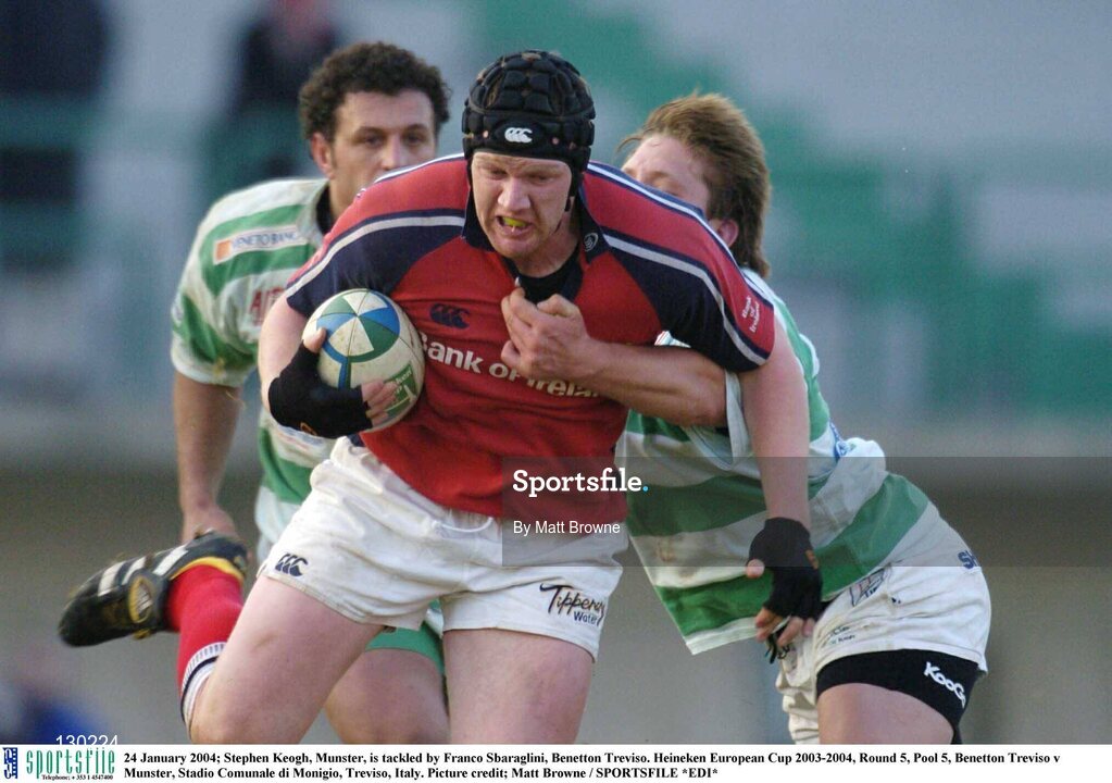 24 January 2004; Stephen Keogh, Munster, is tackled by Franco Sbaraglini, Benetton Treviso. Heineken European Cup 2003-2004, Round 5, Pool 5, Benetton Treviso v Munster, Stadio Comunale di Monigio, Treviso, Italy. Picture credit; Matt Browne / SPORTSFILE *EDI*