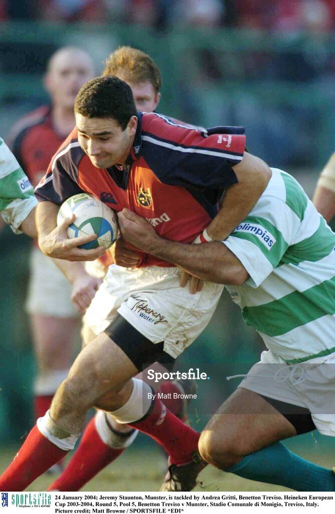 24 January 2004; Jeremy Staunton, Munster, is tackled by Andrea Gritti, Benetton Treviso. Heineken European Cup 2003-2004, Round 5, Pool 5, Benetton Treviso v Munster, Stadio Comunale di Monigio, Treviso, Italy. Picture credit; Matt Browne / SPORTSFILE *EDI*