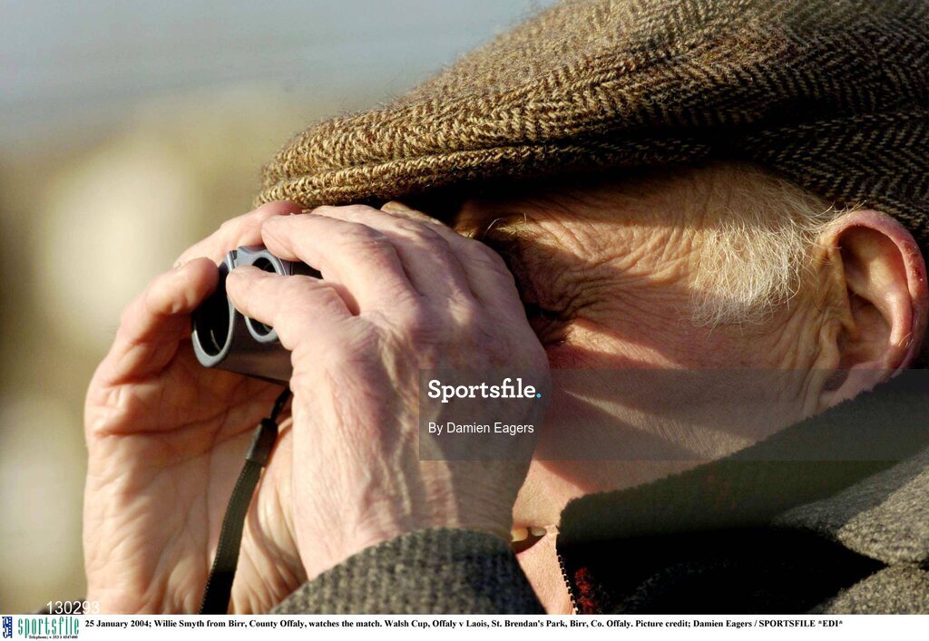 25 January 2004; Willie Smyth, from Birr, Co. Offaly, watches the match. Walsh Cup, Offaly v Laois, St. Brendan's Park, Birr, Co. Offaly. Picture credit; Damien Eagers / SPORTSFILE