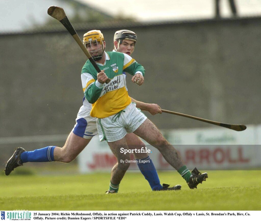 25 January 2004; Richie McRedmond, Offaly, in action against Patrick Cuddy, Laois. Walsh Cup, Offaly v Laois, St. Brendan's Park, Birr, Co. Offaly. Picture credit; Damien Eagers / SPORTSFILE *EDI*