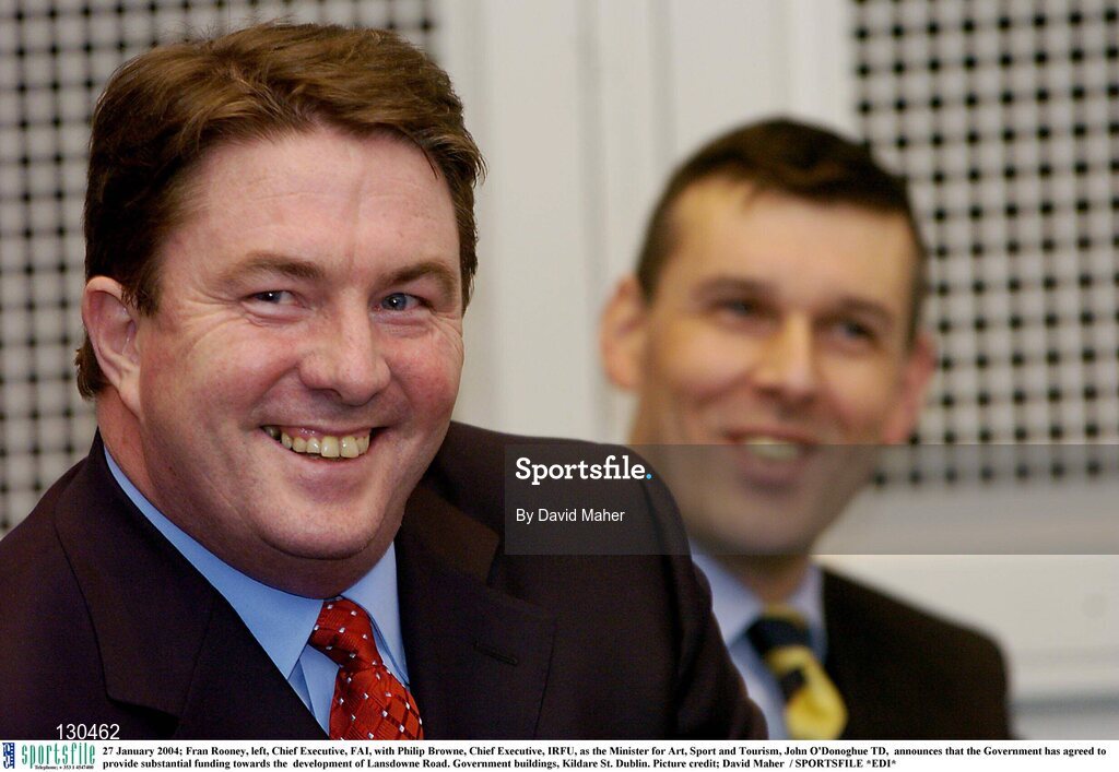 27 January 2004; Fran Rooney, left, Chief Executive, FAI, with Philip Browne, Chief Executive, IRFU, as the Minister for Art, Sport and Tourism, John O'Donoghue TD,  announces that the Government has agreed to provide substantial funding towards the  development of Lansdowne Road. Government buildings, Kildare St. Dublin. Picture credit; David Maher  / SPORTSFILE *EDI*