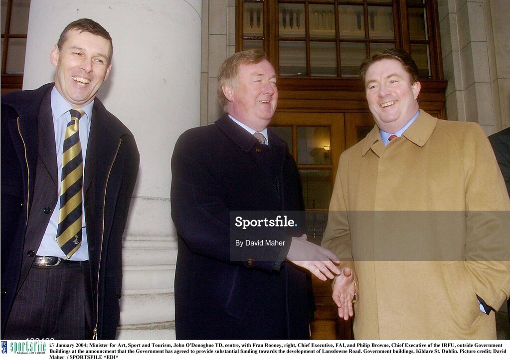 27 January 2004; Minister for Art, Sport and Tourism, John O'Donoghue TD, centre, with Fran Rooney, right, Chief Executive, FAI, and Philip Browne, Chief Executive of the IRFU, outside Government Buildings at the announcment that the Government has agreed to provide substantial funding towards the development of Lansdowne Road. Government buildings, Kildare St. Dublin. Picture credit; David Maher  / SPORTSFILE *EDI*