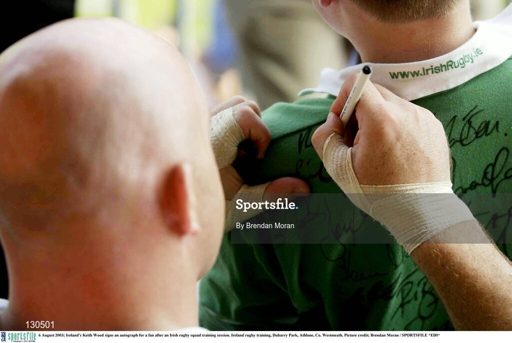 6 August 2003; Ireland's Keith Wood signs an autograph for a fan after an Irish rugby squad training session. Ireland rugby training, Dubarry Park, Athlone, Co. Westmeath. Picture credit; Brendan Moran / SPORTSFILE *EDI*