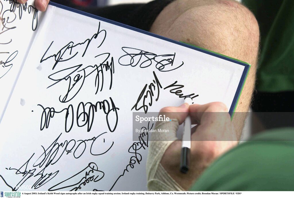 6 August 2003; Ireland's Keith Wood signs autographs after an Irish rugby squad training session. Ireland rugby training, Dubarry Park, Athlone, Co. Westmeath. Picture credit; Brendan Moran / SPORTSFILE *EDI*