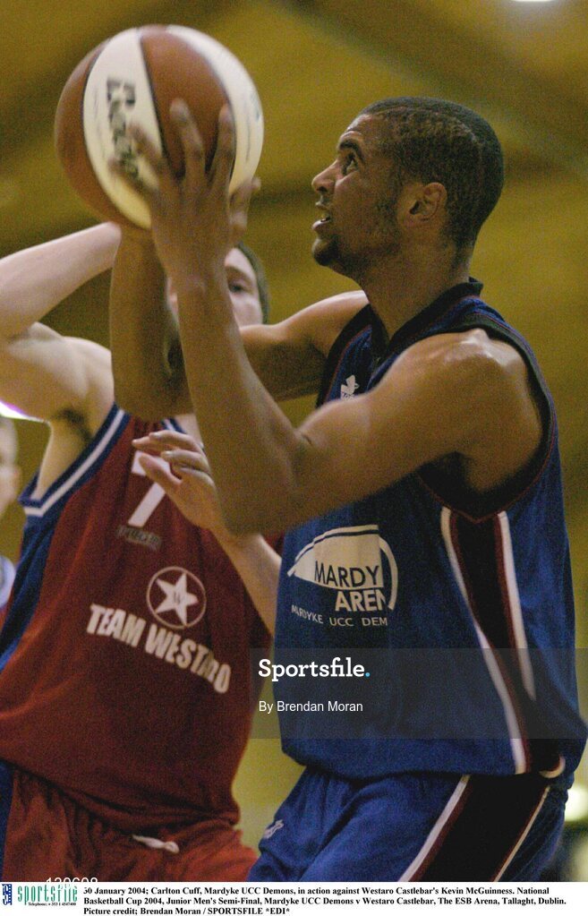 30 January 2004; Carlton Cuff, Mardyke UCC Demons, in action against Westaro Castlebar's Kevin McGuinness. National Basketball Cup 2004, Junior Men's Semi-Final, Mardyke UCC Demons v Westaro Castlebar, The ESB Arena, Tallaght, Dublin. Picture credit; Brendan Moran / SPORTSFILE *EDI*