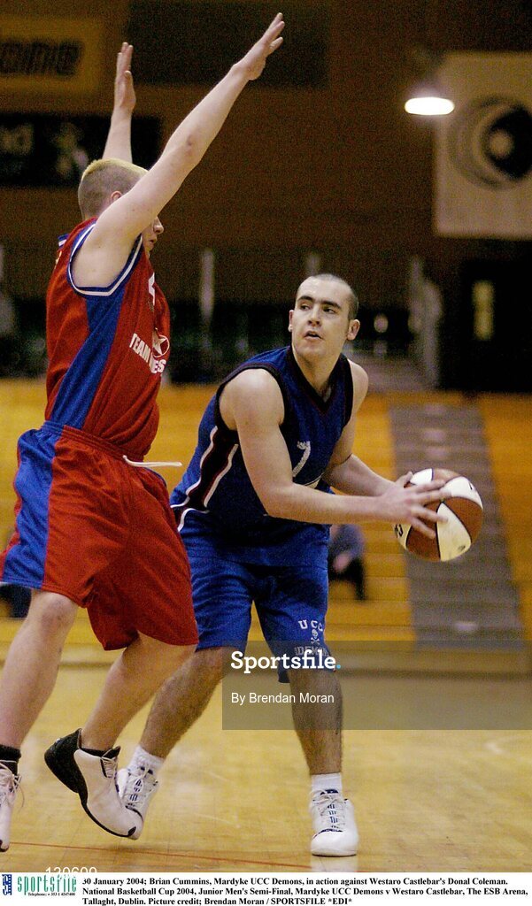 30 January 2004; Brian Cummins, Mardyke UCC Demons, in action against Westaro Castlebar's Donal Coleman. National Basketball Cup 2004, Junior Men's Semi-Final, Mardyke UCC Demons v Westaro Castlebar, The ESB Arena, Tallaght, Dublin. Picture credit; Brendan Moran / SPORTSFILE *EDI*