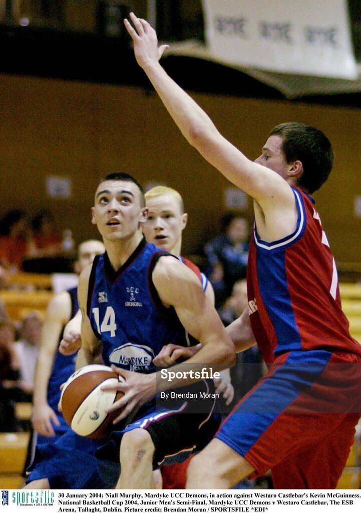 30 January 2004; Niall Murphy, Mardyke UCC Demons, in action against Westaro Castlebar's Kevin McGuinness. National Basketball Cup 2004, Junior Men's Semi-Final, Mardyke UCC Demons v Westaro Castlebar, The ESB Arena, Tallaght, Dublin. Picture credit; Brendan Moran / SPORTSFILE *EDI*