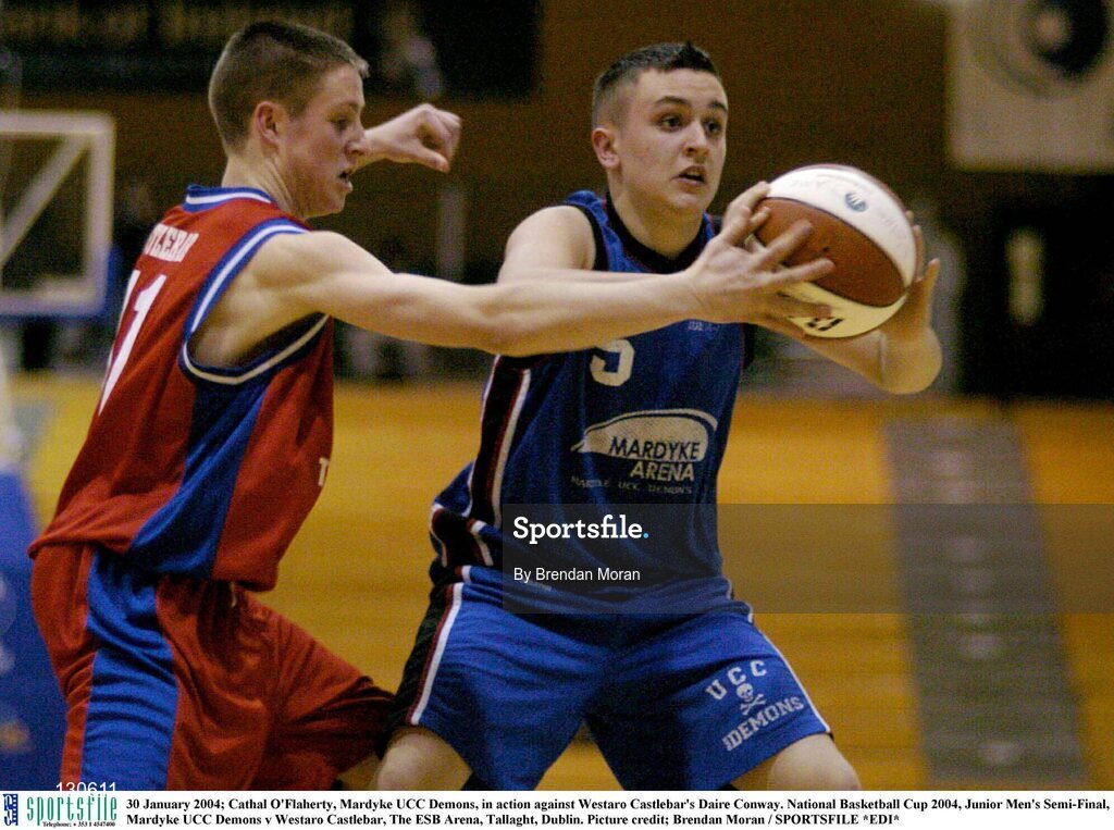 30 January 2004; Cathal O'Flaherty, Mardyke UCC Demons, in action against Westaro Castlebar's Daire Conway. National Basketball Cup 2004, Junior Men's Semi-Final, Mardyke UCC Demons v Westaro Castlebar, The ESB Arena, Tallaght, Dublin. Picture credit; Brendan Moran / SPORTSFILE *EDI*