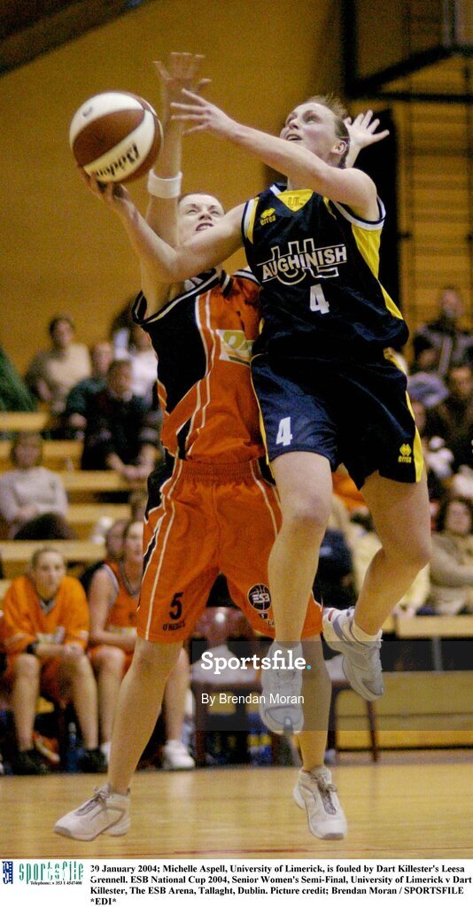 30 January 2004; Michelle Aspell, University of Limerick, is fouled by Dart Killester's Leesa Grennell. ESB National Cup 2004, Senior Women's Semi-Final, University of Limerick v Dart Killester, The ESB Arena, Tallaght, Dublin. Picture credit; Brendan Moran / SPORTSFILE *EDI*