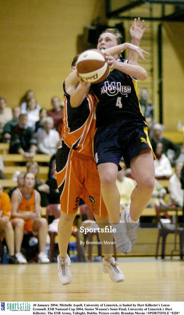 30 January 2004; Michelle Aspell, University of Limerick, is fouled by Dart Killester's Leesa Grennell. ESB National Cup 2004, Senior Women's Semi-Final, University of Limerick v Dart Killester, The ESB Arena, Tallaght, Dublin. Picture credit; Brendan Moran / SPORTSFILE *EDI*