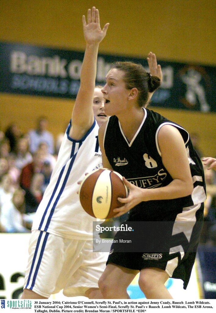 30 January 2004; Caitriona O'Connell, Scruffy St. Paul's, in action against Jenny Coady, Bausch & Lomb Wildcats. ESB National Cup 2004, Senior Women's Semi-Final, Scruffy St. Paul's v Bausch & Lomb Wildcats, The ESB Arena, Tallaght, Dublin. Picture credit; Brendan Moran / SPORTSFILE *EDI*