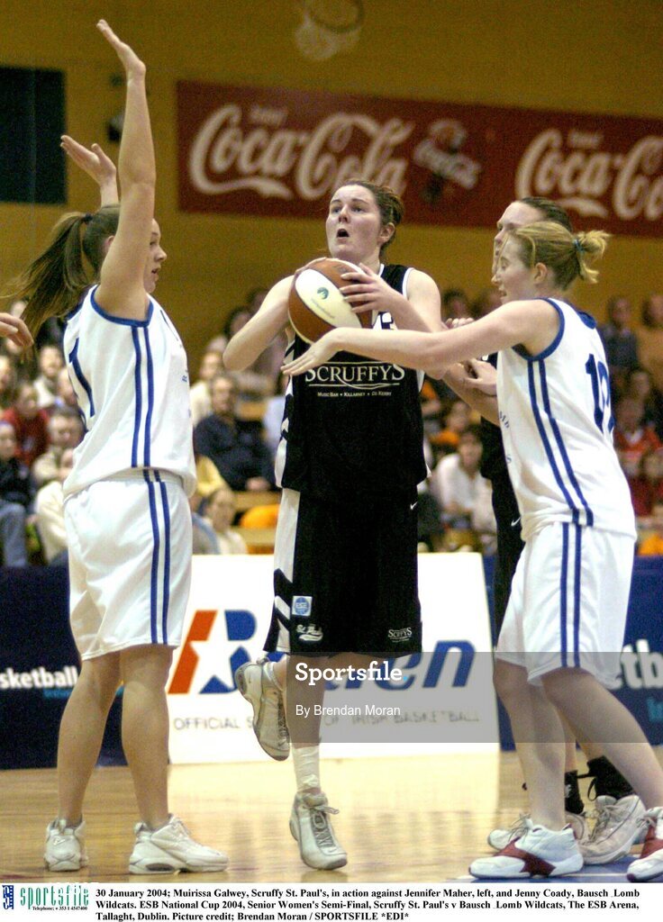 30 January 2004; Muirissa Galwey, Scruffy St. Paul's, in action against Jennifer Maher, left, and Jenny Coady, Bausch & Lomb Wildcats. ESB National Cup 2004, Senior Women's Semi-Final, Scruffy St. Paul's v Bausch & Lomb Wildcats, The ESB Arena, Tallaght, Dublin. Picture credit; Brendan Moran / SPORTSFILE *EDI*