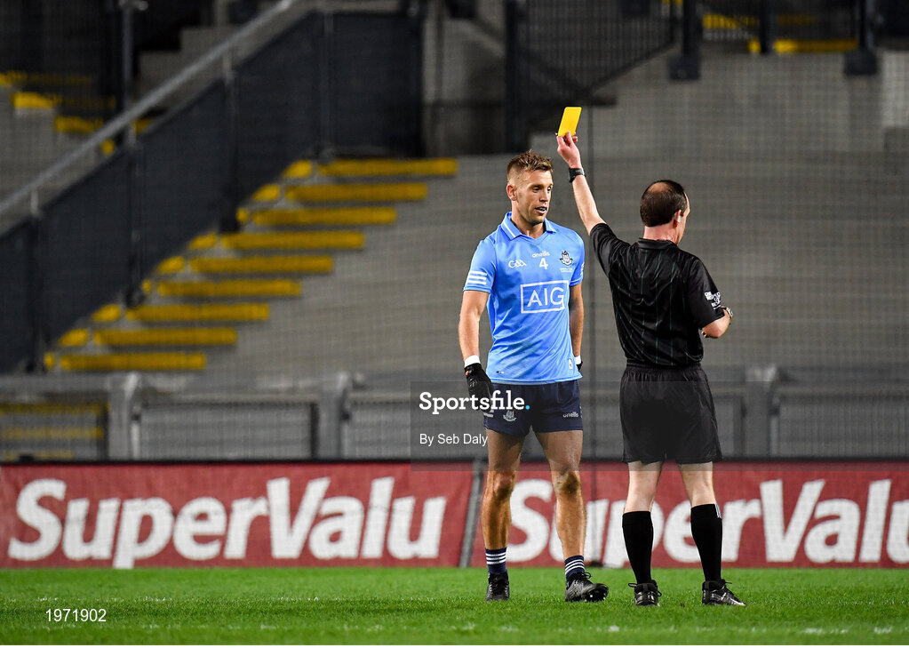 19 December 2020; Jonny Cooper of Dublin is shown a yellow card by referee David Coldrick during the GAA Football All-Ireland Senior Championship Final match between Dublin and Mayo at Croke Park in Dublin. Photo by Seb Daly/Sportsfile