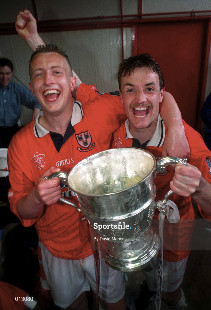 4 May 1997; Shelbourne goalscorers Dave Campbell, left, and Stephen Geoghegan celebrate with the trophy following their side's victory during the FAI Cup Final match between Derry City and Shelbourne at Dalymount Park in Dublin. Photo by David Maher/Sportsfile