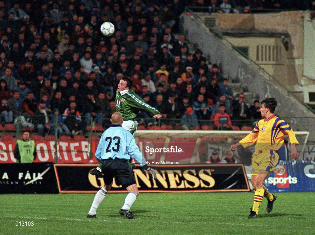 30 April 1997; David Connolly of Republic of Ireland heads the ball over Bogdan Stelea of Romania during the FIFA World Cup 1998 Group 8 Qualifiying match between Romania and Republic of Ireland at Stadionul Steaua in Bucharest, Romania. Photo by Ray McManus/Sportsfile