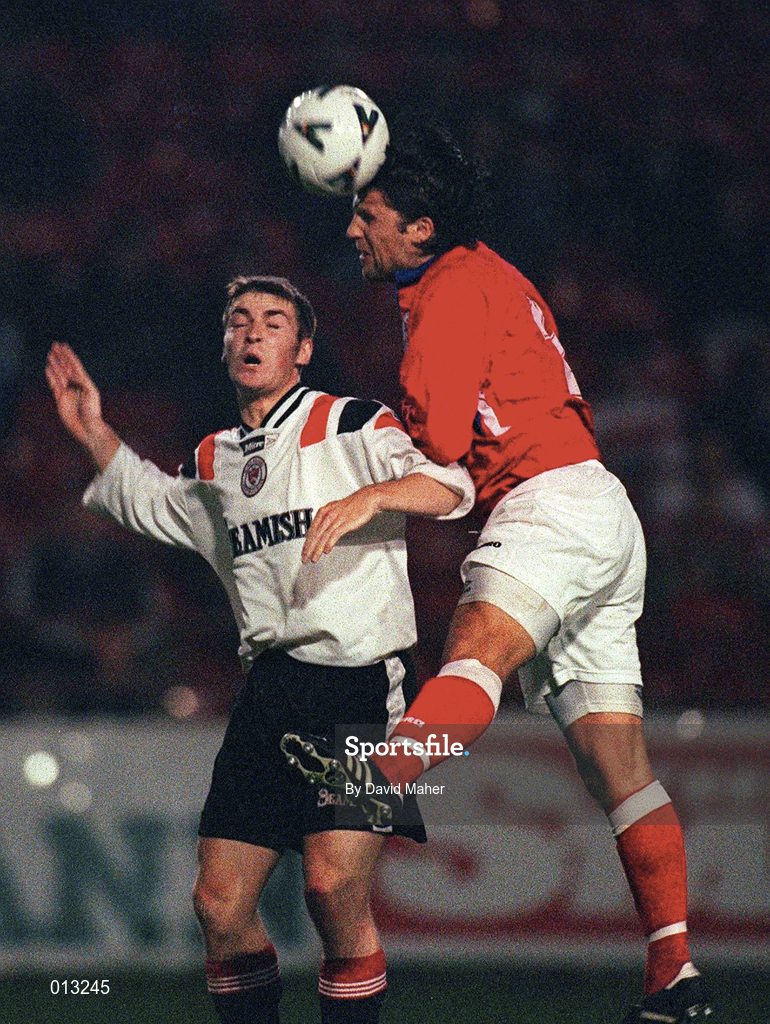 26 Sept 1998; Greg Costello of Shelbourne in action against Jim Sheridan of Sligo Rovers during the Harp Lager National League Premier Division match between Shelbourne and Sligo Rovers at Tolka Park in Dublin. Photo by David Maher/Sportsfile