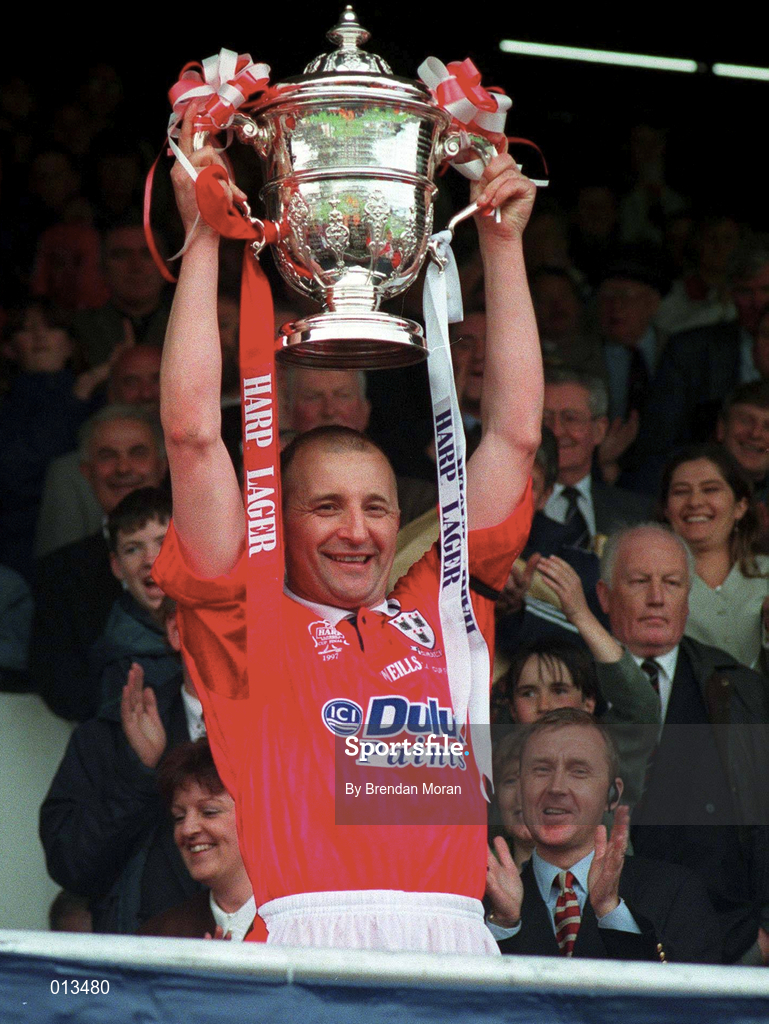 4 May 1997; Shelbourne captain Mick Neville lifts the FAI Cup following his side's victory during the FAI Cup Final match between Derry City and Shelbourne at Dalymount Park in Dublin. Photo by Brendan Moran/Sportsfile