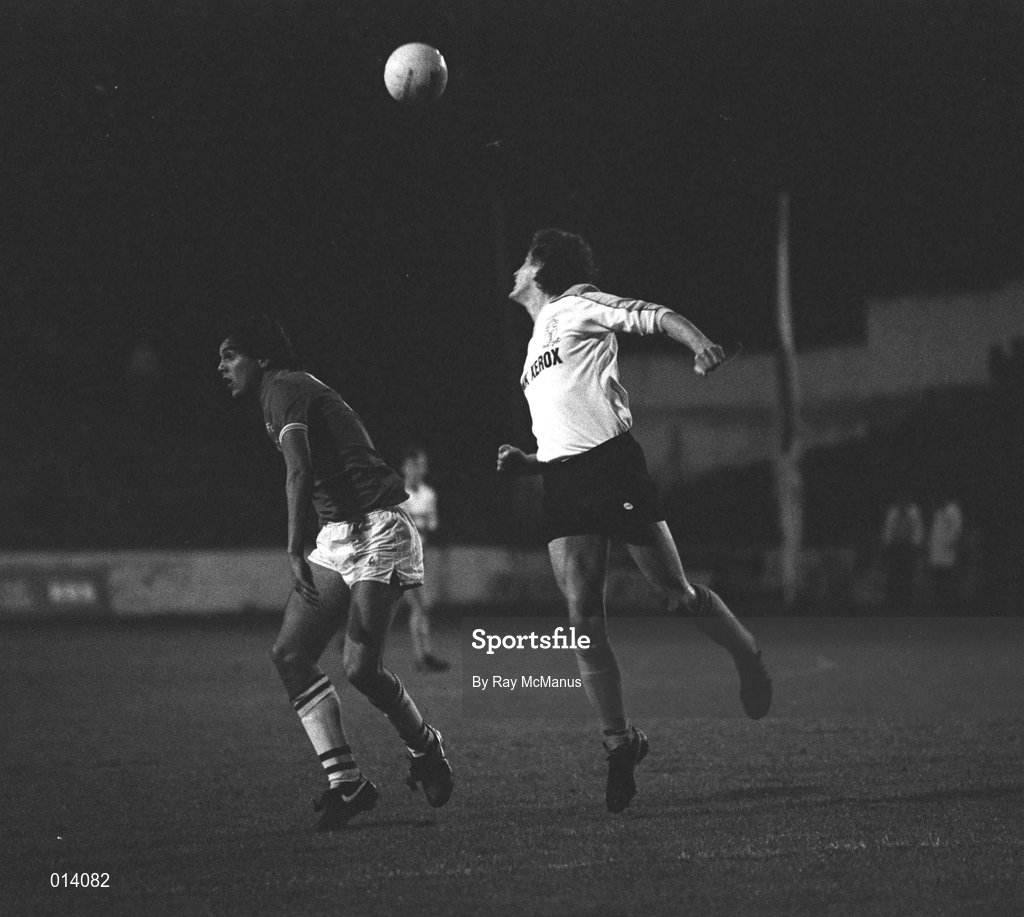 19 September 1984; Paddy Dunning of UCD in action against Graeme Sharp of Everton during the UEFA European Cup Winners' Cup Round 1 First Leg match between UCD and Everton at Tolka Park in Dublin. Photo by Ray McManus/Sportsfile