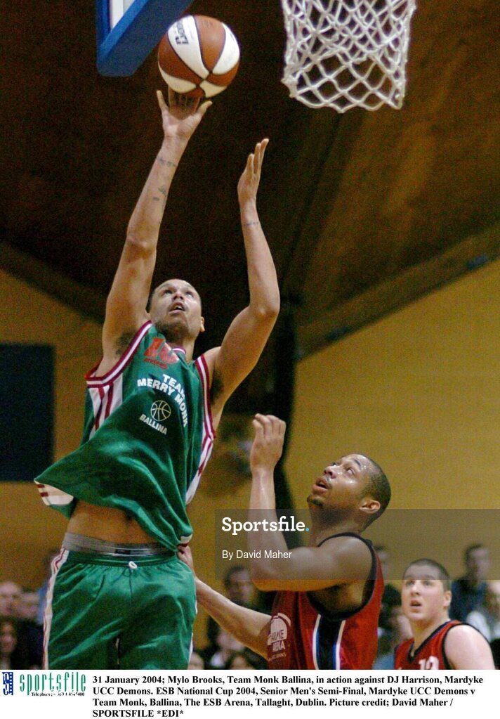 31 January 2004; Mylo Brooks, Team Merry Monk Ballina, in action against DJ Harrison, Mardyke UCC Demons. ESB National Cup 2004, Senior Men's Semi-Final, Mardyke UCC Demons v Team Merry Monk, Ballina, The ESB Arena, Tallaght, Dublin. Picture credit; David Maher / SPORTSFILE *EDI*