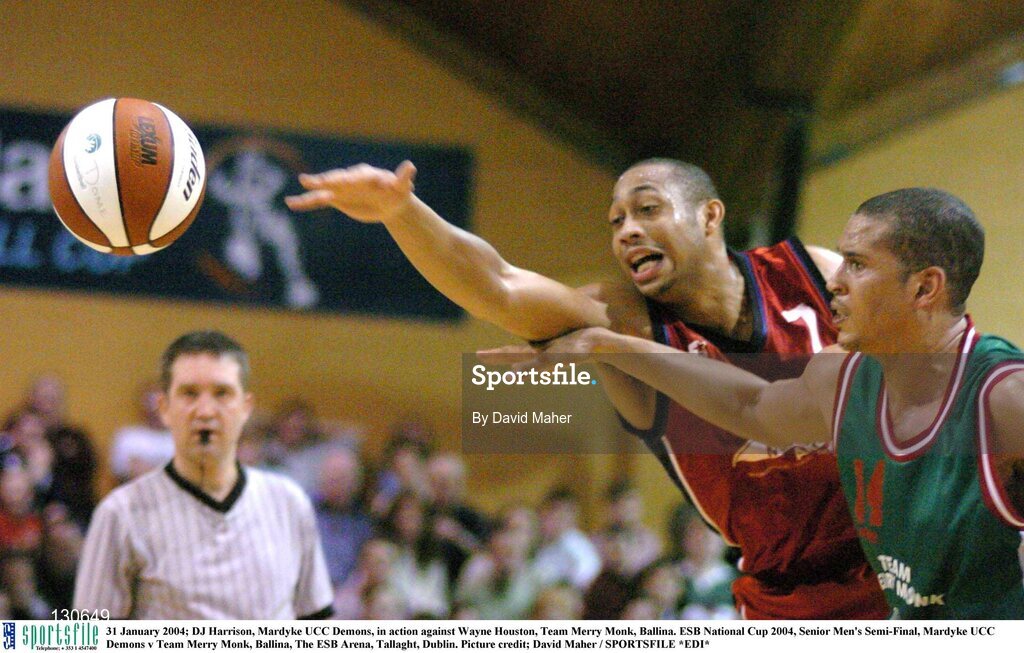 31 January 2004; DJ Harrison, Mardyke UCC Demons, in action against Wayne Houston, Team Merry Monk, Ballina. ESB National Cup 2004, Senior Men's Semi-Final, Mardyke UCC Demons v Team Merry Monk, Ballina, The ESB Arena, Tallaght, Dublin. Picture credit; David Maher / SPORTSFILE *EDI*