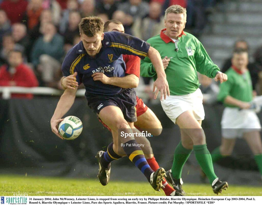 31 January 2004; John McWeeney, Leinster Lions, is stopped from scoring an early try by Philippe Bidabe, Biarritz Olympique. Heineken European Cup 2003-2004, Pool 3, Round 6, Biarritz Olympique v Leinster Lions, Parc des Sports Aguilera, Biarritz, France. Picture credit; Pat Murphy / SPORTSFILE *EDI*