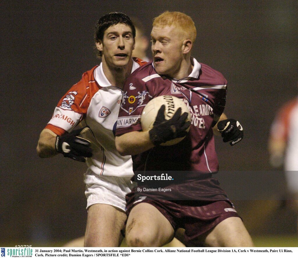 31 January 2004; Paul Martin, Westmeath, in action against Bernie Collins Cork. Allianz National Football League Division 1A, Cork v Westmeath, Pairc Ui Rinn, Cork. Picture credit; Damien Eagers / SPORTSFILE *EDI*